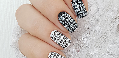 Contrast manicure with lettering