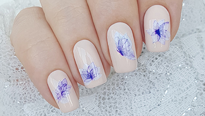 Summer manicure with butterflies and flowers