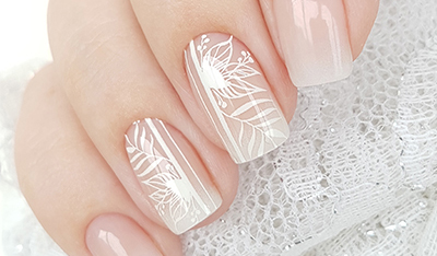 Nude manicure with white tracery