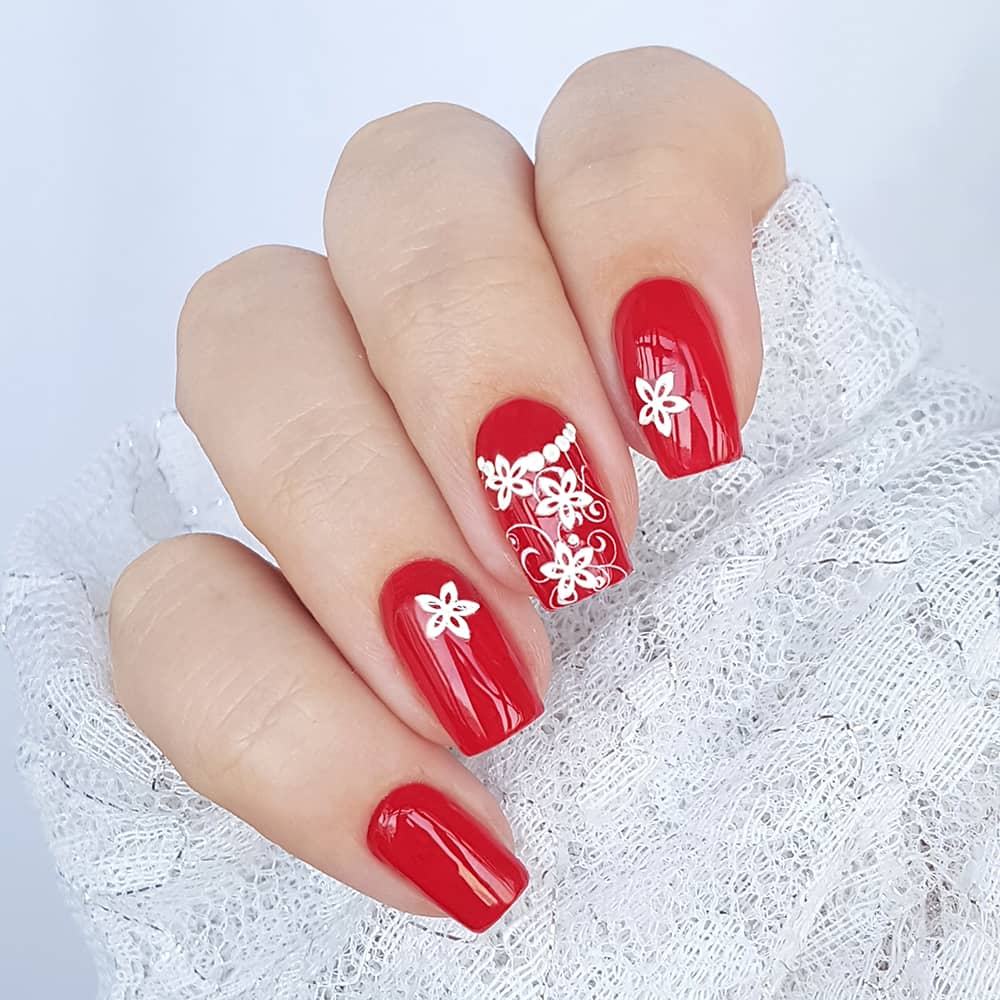 Bright manicure with volume flowers