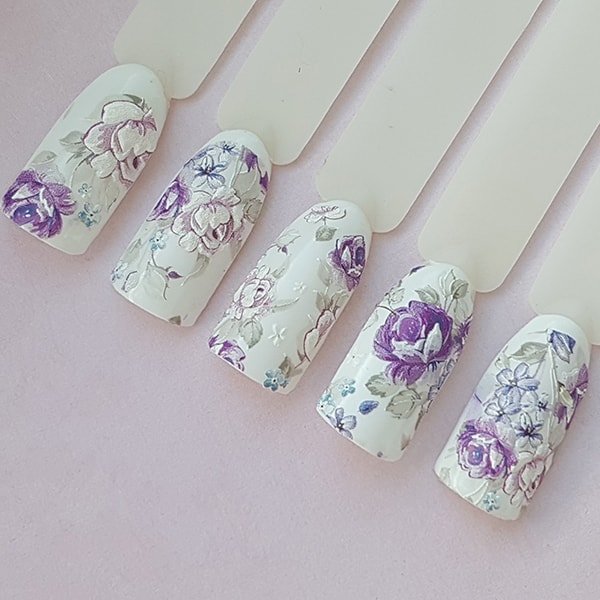 Nail design with purple peonies