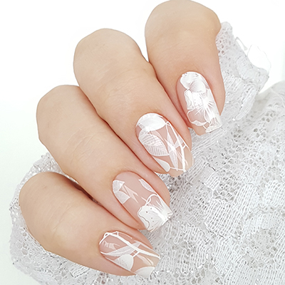 Nude manicure with floral design