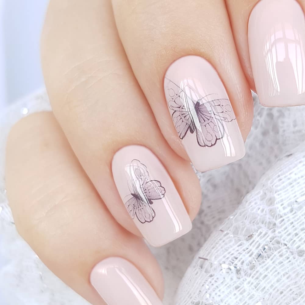 Manicure with graphic butterflies