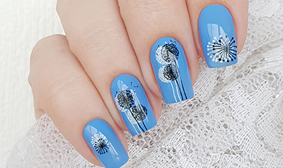 Graphic manicure with dandelions